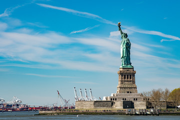 new york manhattan statue of liberty tourist selfie with smartphone