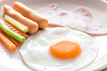 Breakfast with fried eggs, bacon
