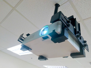 digital projector working on ceiling room