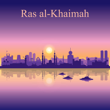 Ras al-Khaimah silhouette on sunset background