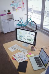 Technologies with drawings on desk in creative office