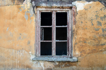 Old wooden window without glass.