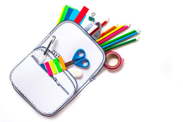 Creative school bag made of paper with school stationery