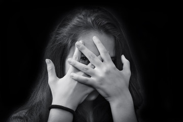 Monochrome close up portrait of young beautiful girl