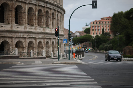 Pedestrian crossing opposite the Roman Coliseum. Italy
