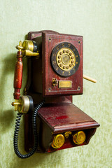 antique phone on the wall