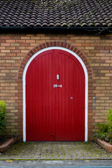 Bright red door and brickwork