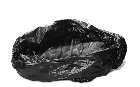 Crumpled, open black plastic garbage bag, isolated on white background