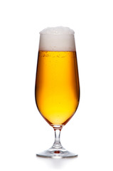 elegant glass of cold beer with foam isolated.