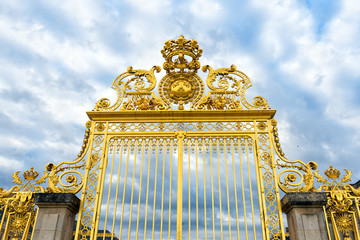 Versailles palace golden entrance,symbol of king louis XIV power, France.