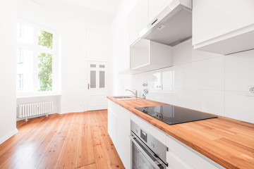 modern white kitchen in new apartment
