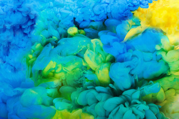 Colorful acrylic ink in water isolated. Abstract background. Color explosion