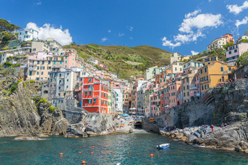Fototapeta na wymiar Colourful Riomaggiore in National park Cinque Terre, Liguria, Italy 