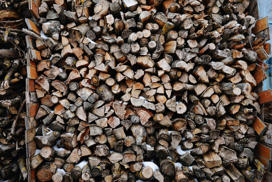 A stack of birch firewood - a natural background