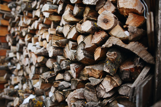 A stack of birch firewood - a natural background