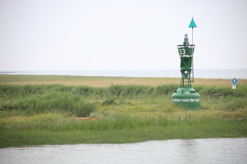 Boje an der Hafeneinfahrt Fedderwardersiel, Nordsee