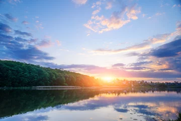 Foto op Canvas wonderful sunset over the lake. © cezarksv