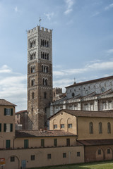 Fototapeta na wymiar Belltower of San Martino Cathedral in Lucca, Tuscany, Italy
