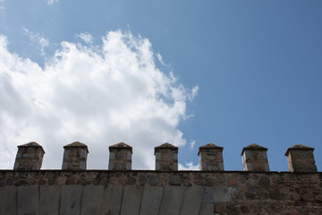 The wall of the fortress and the blue sky