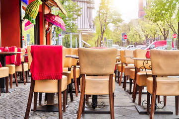 empty street cafe with leather chairs in Berlin