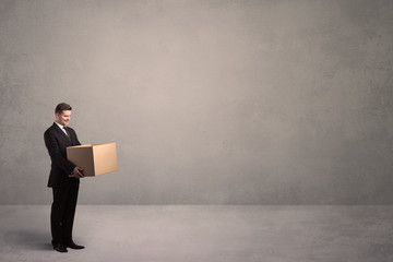 Businessman with empty box