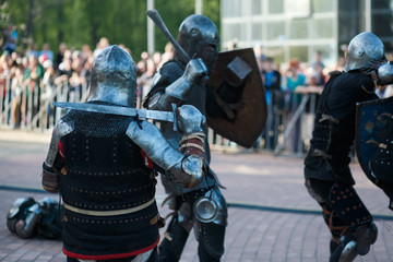 Fighting knightly view with a sword on his shoulder