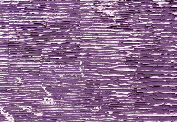 Violet color peeling paint surface.