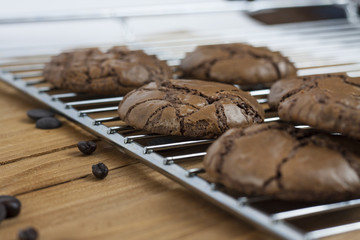 Black Brownie Cookies on a metallic grill cooler