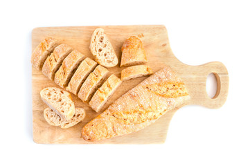 Sliced french baguette on cutting board