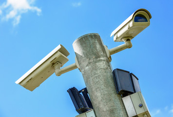 CCTV Security camera and urban video. Closeup view.