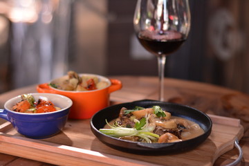 meat and mushrooms with wine