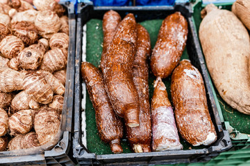 Many different medicinal and food roots on the market counter