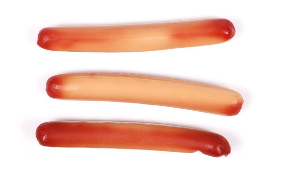 Stale, rotten unhealthy sausages isolated on a white background