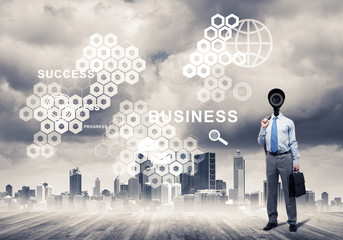 Camera headed man standing on wooden floor against modern citysc