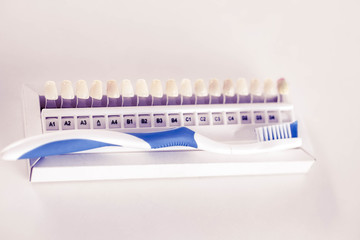 dental care toothbrush with dentist tools on white background