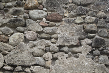 Old medieval stone wall. Medieval fortification photo texture.