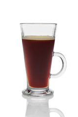 Tall transparent cup of strong black coffee isolated on white.