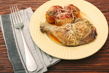 Roasted chicken legs with potato