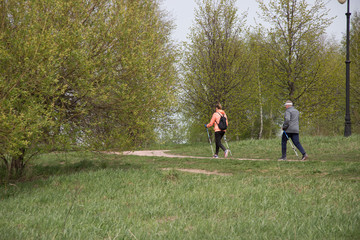 nordic walking people in park