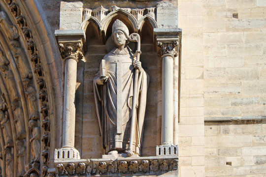 View on Notre-Dame Cathedral statue, front view, paris city, france