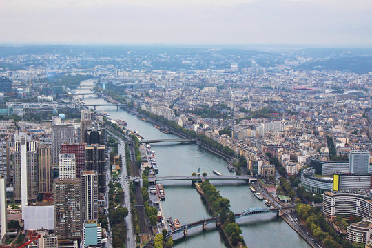 Panoramic view on paris city and seine river from the top of eiffel tower, france