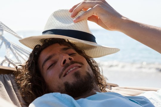 Smiling Man Relaxing In Hammock