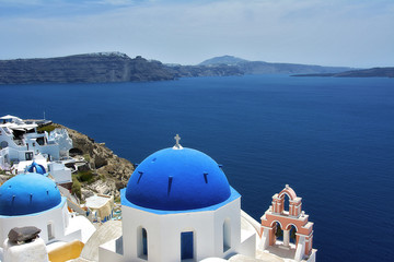 Santorini scene with famous blue dome churches, Oia