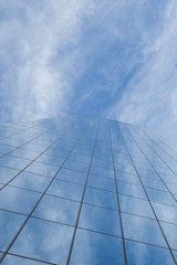 Fototapeta na wymiar Modern Building Glass Architecture Clouds Wall Detail 
