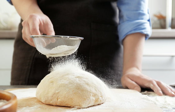 Chef making dough in kitchen, closeup