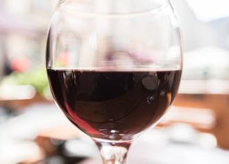 Blurred red wine background. Selective focus.