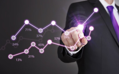 Businessman touch screen concept - Growth Chart