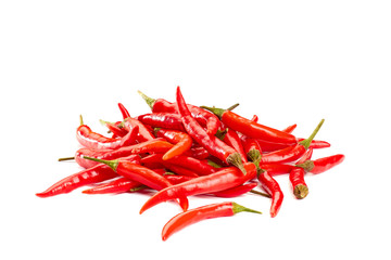 Heap of red chili peppers on white