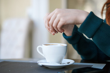 pour the instant coffee into the cup