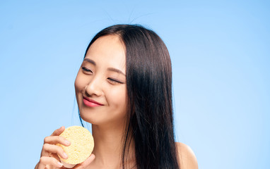 happy woman with yellow sponge